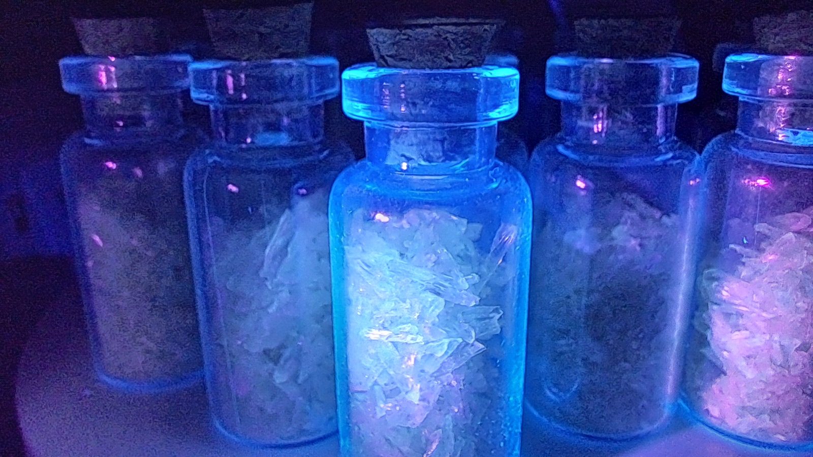 Phosphorescent Cave Calcite Crystal Shards in a Glass Cork Bottle x10